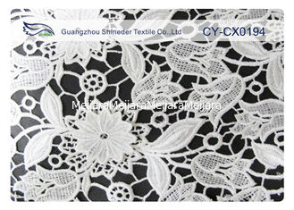 China Tela bordada blanco impresa aduana del cordón del vestido de boda para la ropa interior proveedor