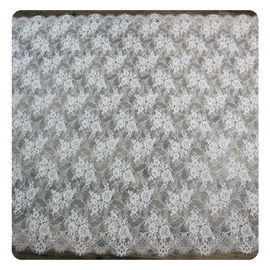Tela nupcial de teñido normal afilada horneada a la crema y con pan rallado floral de marfil de nylon del cordón del vestido proveedor
