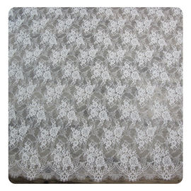 Tela nupcial de teñido normal afilada horneada a la crema y con pan rallado floral de marfil de nylon del cordón del vestido proveedor