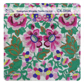 Tela bordada floral colorida del cordón del ganchillo para la ropa de la moda proveedor
