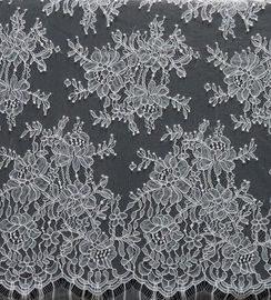 diseño floral blanco de la tela de nylon del cordón de la anchura del 150cm para el vestido proveedor
