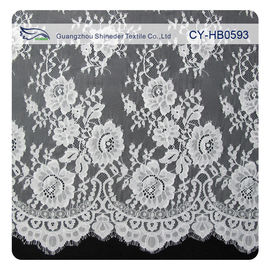 Tela de nylon para los vestidos de boda, tela floral horneada a la crema y con pan rallado del cordón de Chantily del cordón proveedor