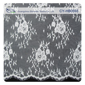 Tela de nylon para los vestidos de boda, tela floral horneada a la crema y con pan rallado del cordón de Chantily del cordón proveedor